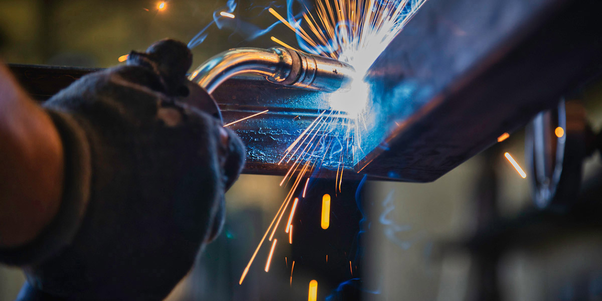 Corner of bakery rack being welded