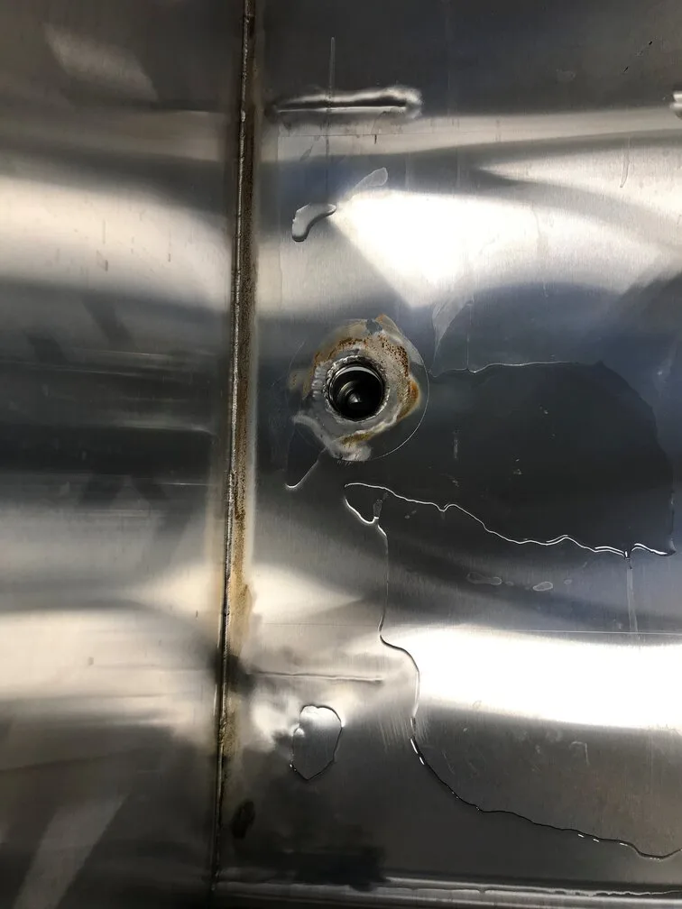 rusted hole in stainless steel equipment