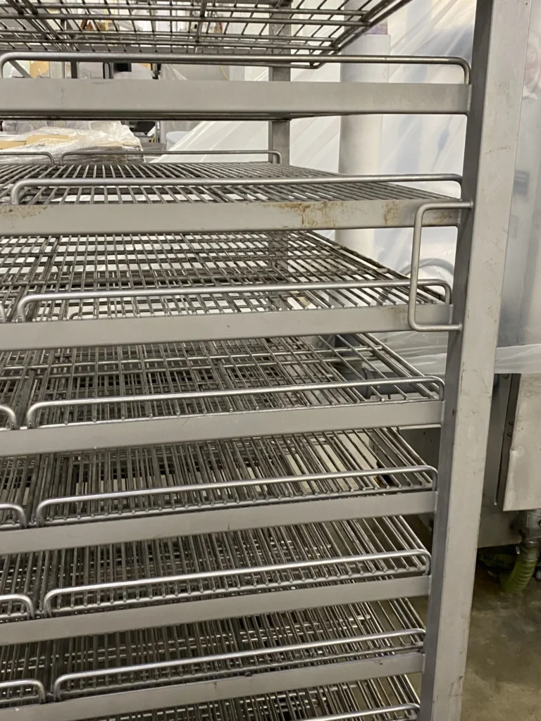 Heavy duty meat processing racks with reinforced shelves and handles | Schaumburg Specialties